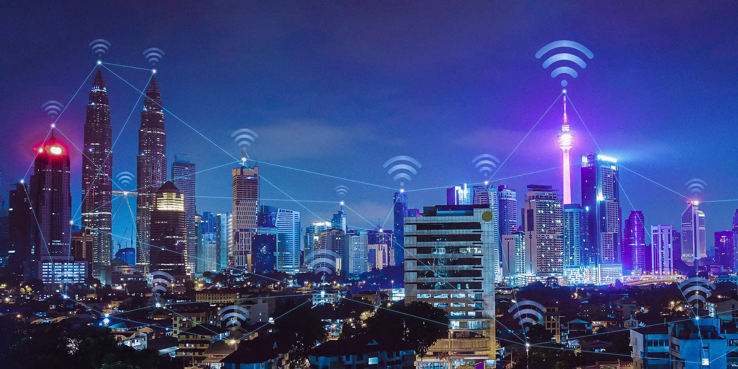 Photograph of a cityscape with illustrative overlay of lines and icons to signify connectivity