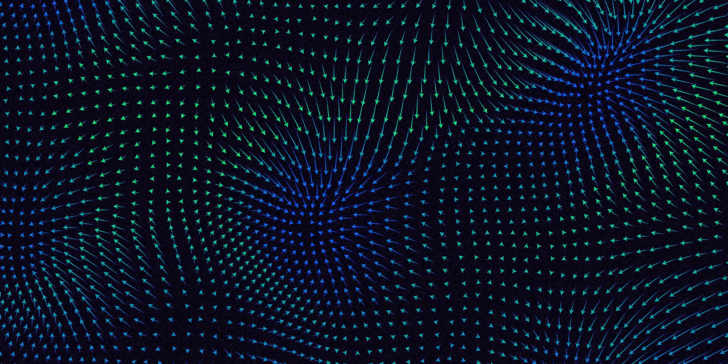 Hundreds of small arrows each pointing in different directions and made to resemble a magnetic field