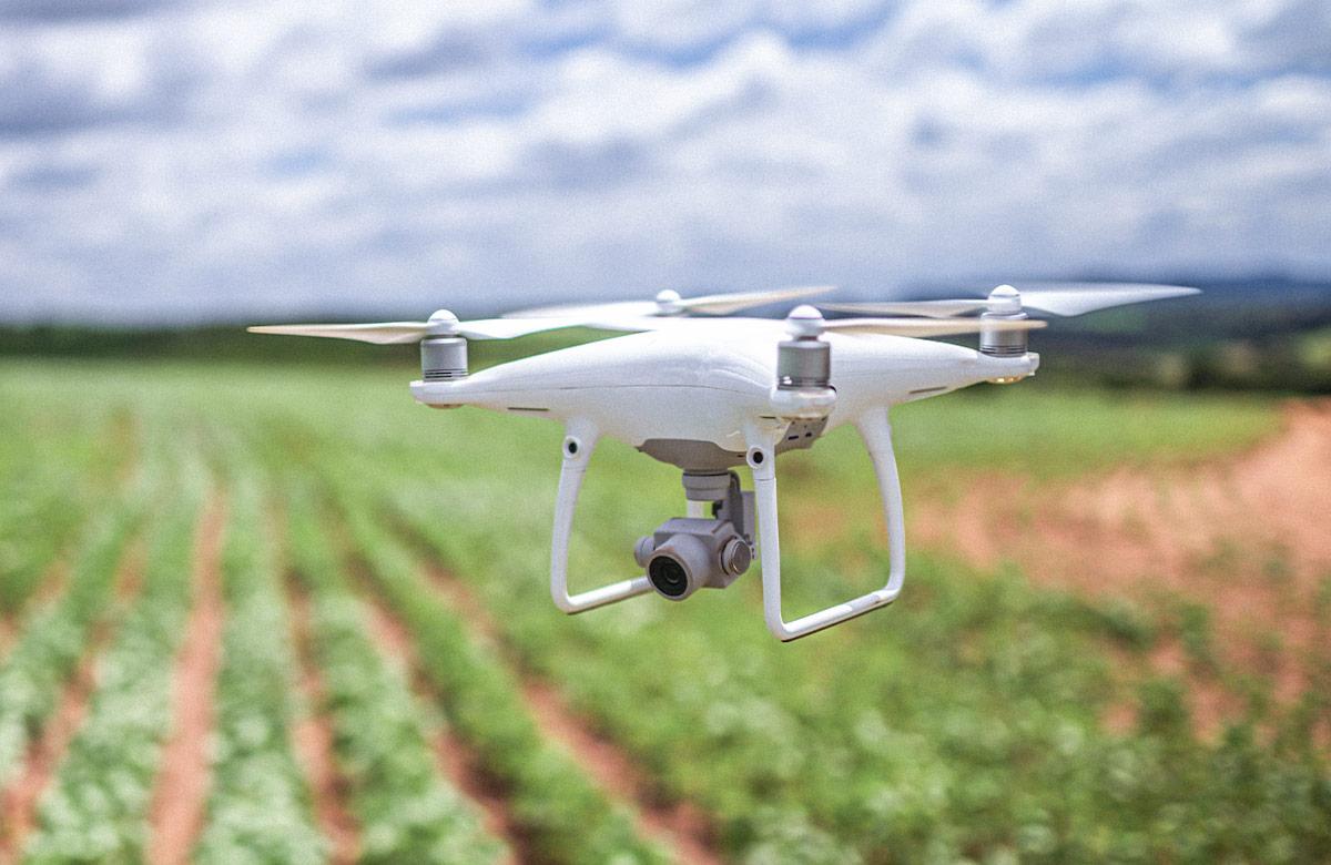 Drone flying over a farm field
