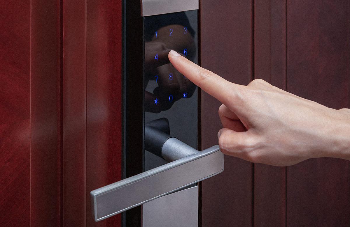 Photograph of person interacting with an automatic coffee machine