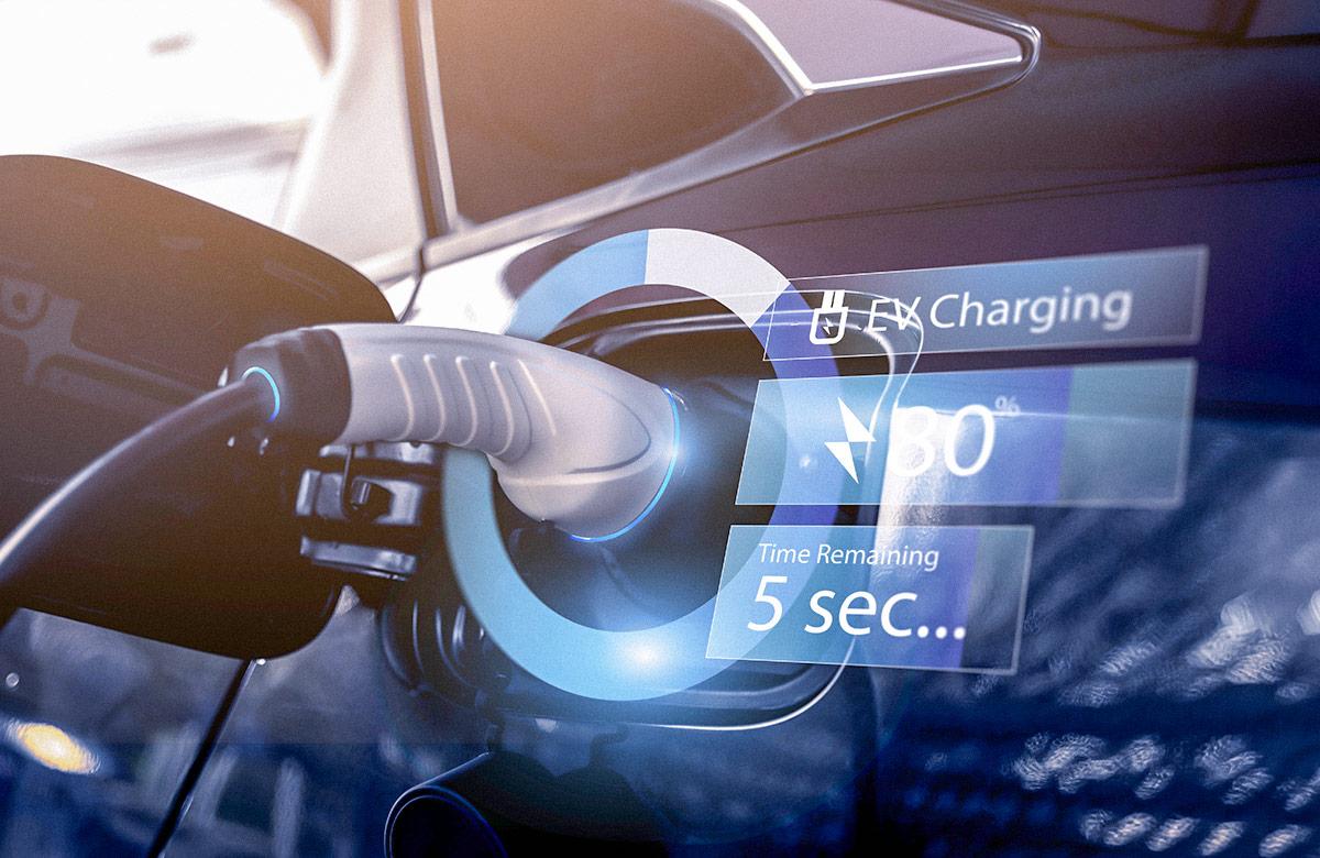 Electric vehicle charging with power cable plugged in with modern technology information overlaid on image