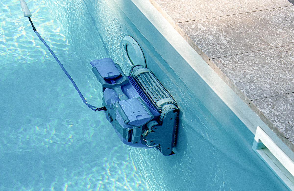 Pool cleaning robot at work underwater