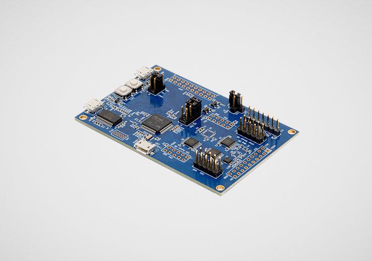 DK-45605: Blue PCB with many small chips and components attached to it