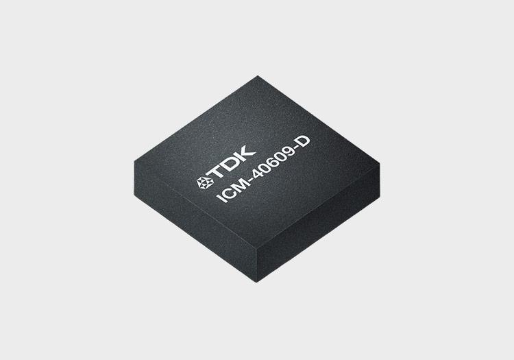 Microchip with TDK logo and "ICM-40609-D" etched onto its surface