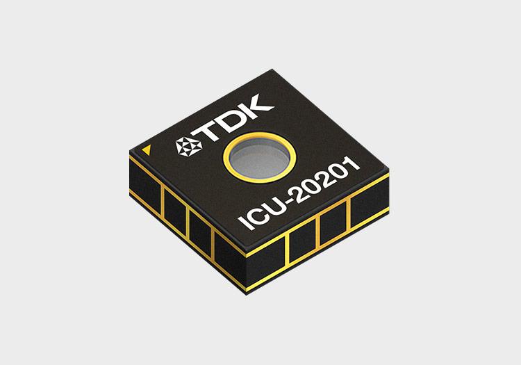 Microchip with TDK logo and "ICU-20201" etched onto its surface